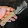 Photo envoyée par Karim B. : PeelPro tenu par le manche en bois